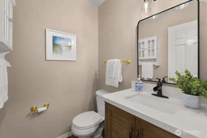 Updated half bath on the main floor.