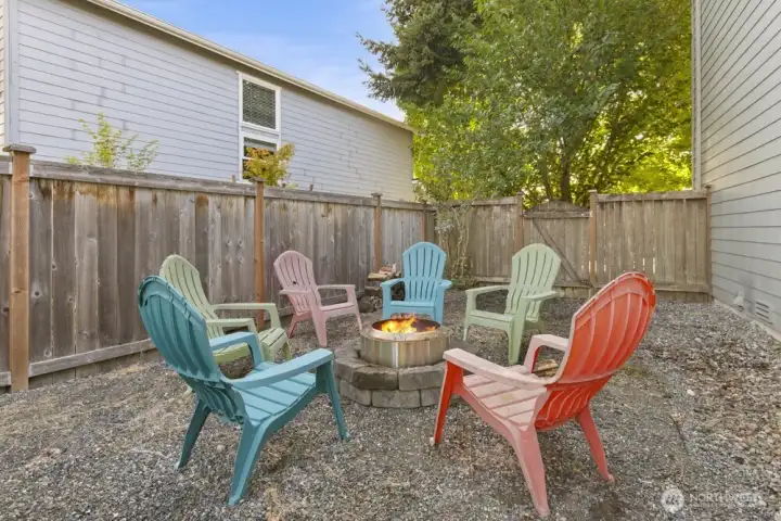 Outdoor fire pit area perfect for year-round entertaining.