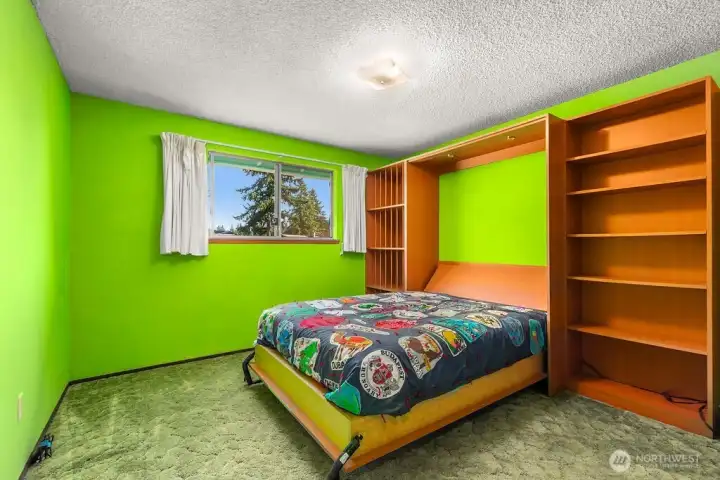 Large second bedroom (murphy bed shown) and additional storage with large closet