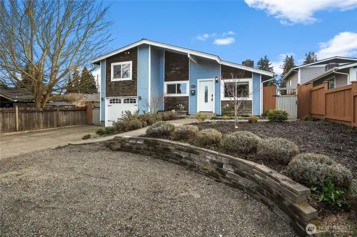 Additional parking area off 21st. Gated driveway entrance off alley