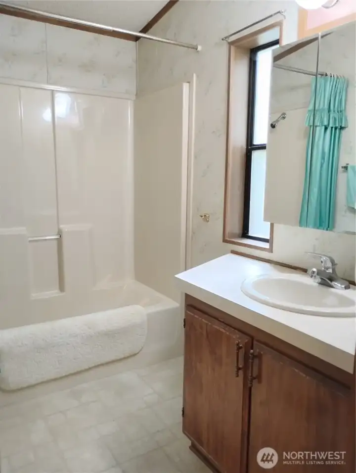 Primary bedroom bathroom with medicine cabinet and storage under the sink. Primary bedroom bathroom with medicine cabinet and storage under the sink.