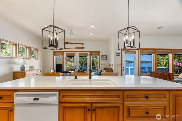 Updated counters and fixtures and a great, big undermount sink makes for easy clean up, with a view!