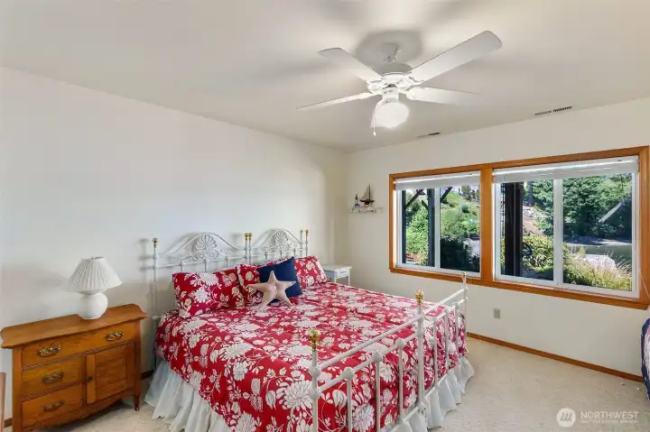 Lower level large bedroom with views to the water