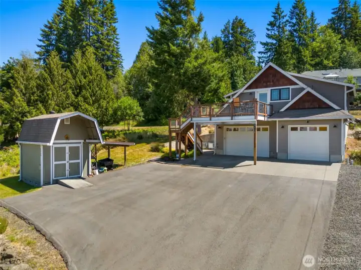 Included in the sale is the additional parking, large garage with 3/4 bath, storage and full, private apartment across the street.