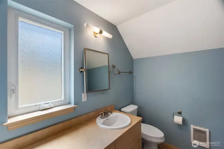 Bathroom features the laundry area with a stackable washer and dryer included in the sale!