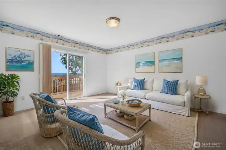 Lower level family room with slider to another back deck