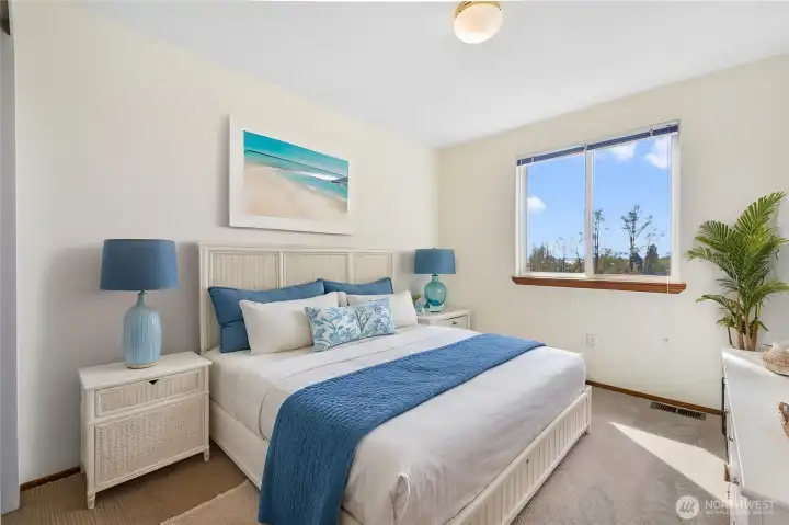 Upper level bedroom facing the view