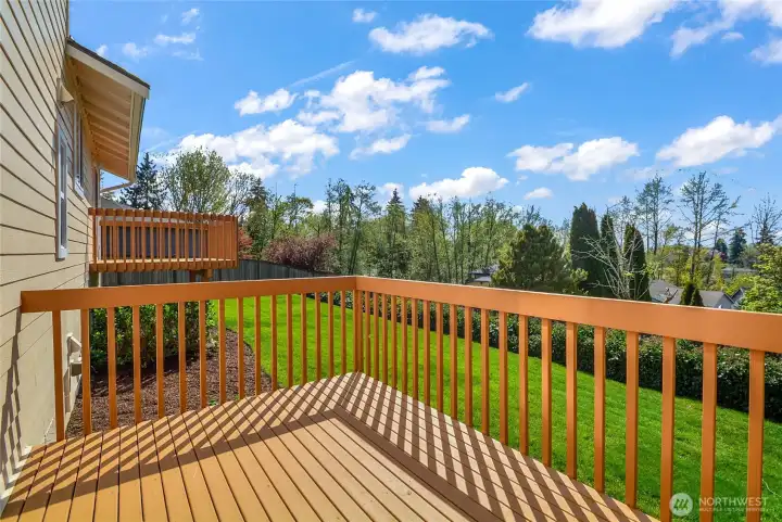 Back yard with two decks!