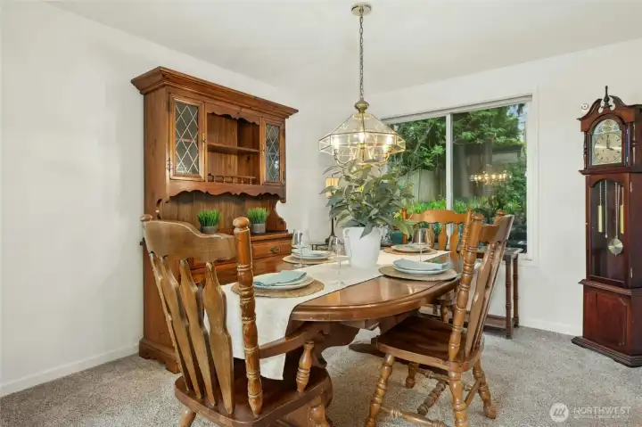Formal dining room with a beautiful outlook.