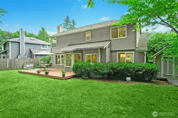 Side yard includes a shed for all of your garden supplies.