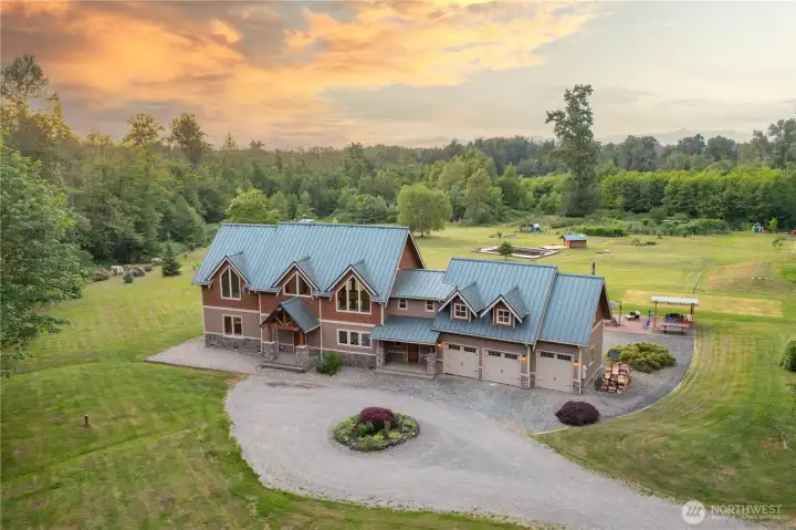 Custom timber frame home on tranquil acreage.