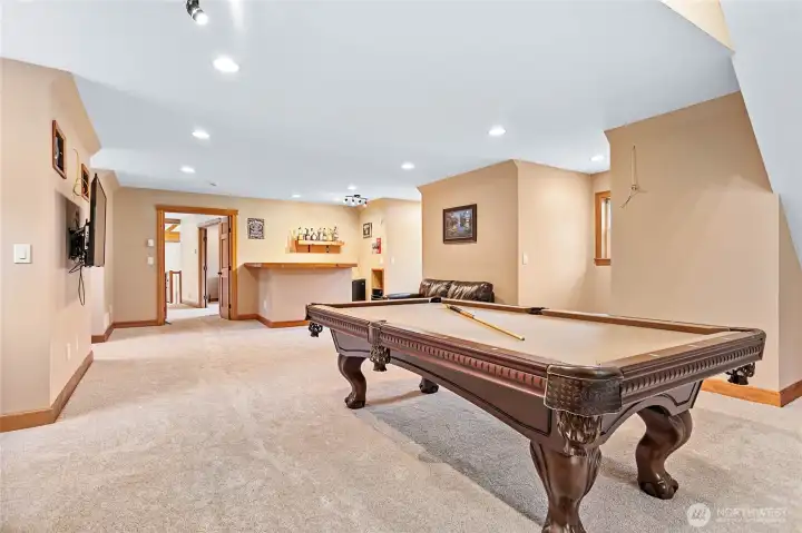 Spacious bonus room with wet bar.