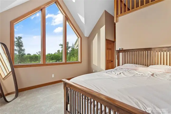 Upper bedrooms have amazing views with 14-foot ceilings and a loft .