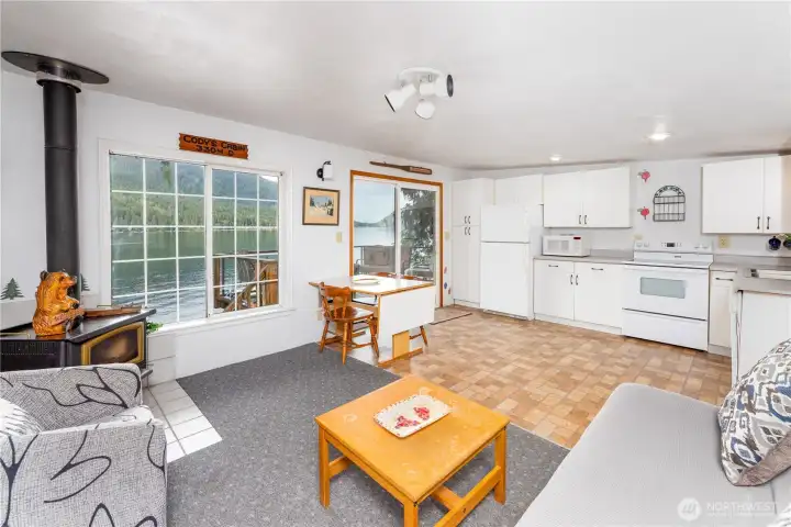 Open concept kitchen with eating space and living room. Open concept kitchen with eating space and living room.