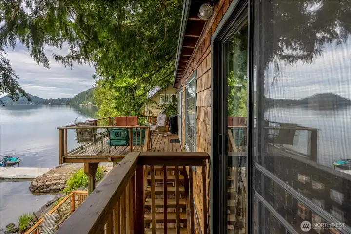 Deck leading out from primary bedroom. Deck leading out from primary bedroom.