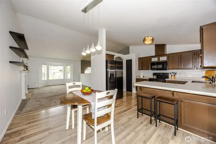 Spacious kitchen leads to multi level back deck