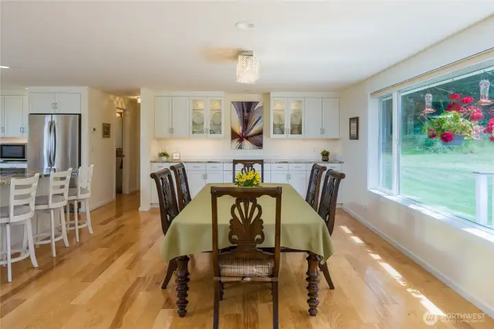 Spacious dining area and built-in buffet with lighted cabinets.
