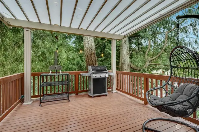 Covered deck just outside! Perfect for grilling, relaxing and enjoying nature!