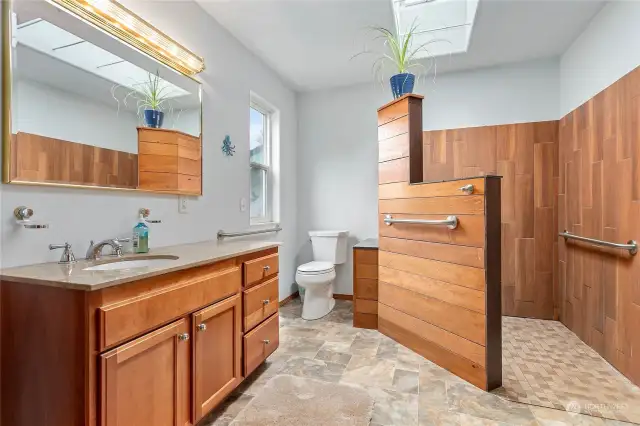 Ensuite bathroom with two entries. One from the bedroom, one from the upstairs hallway.