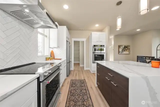 Kitchen with quartz water fall counter