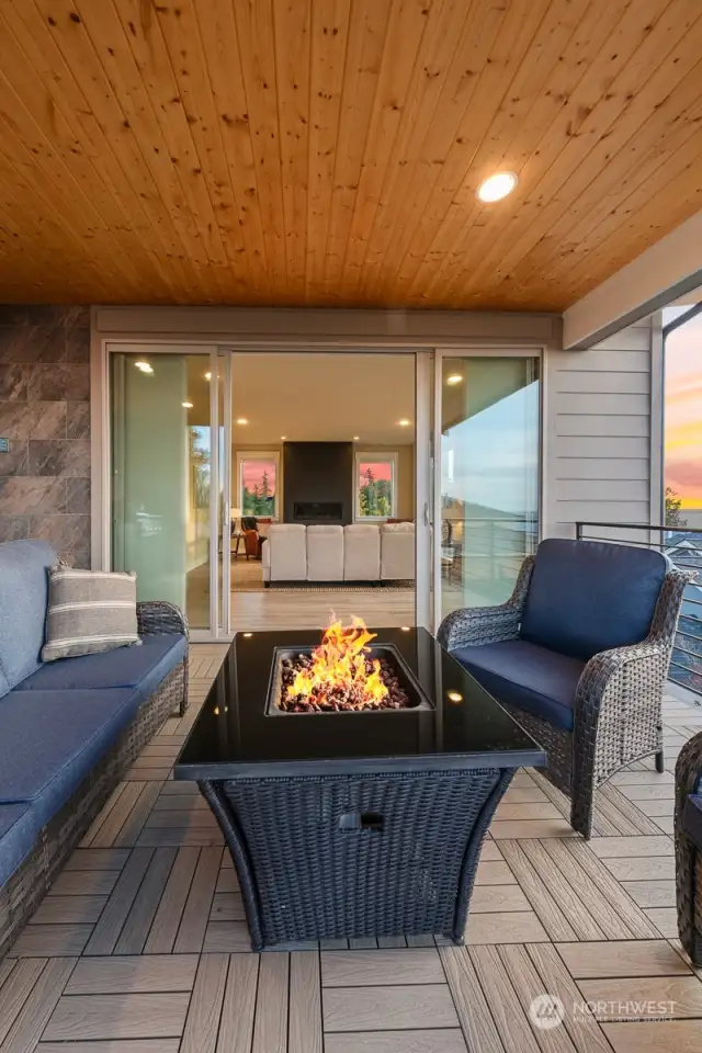 Covered deck with expansive views of Puget Sound