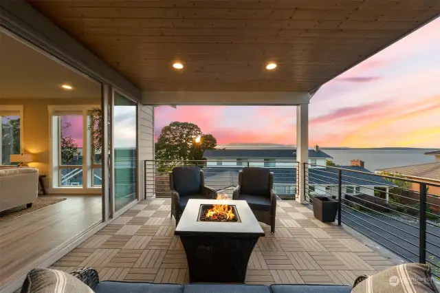 Covered deck with expansive views of Puget Sound