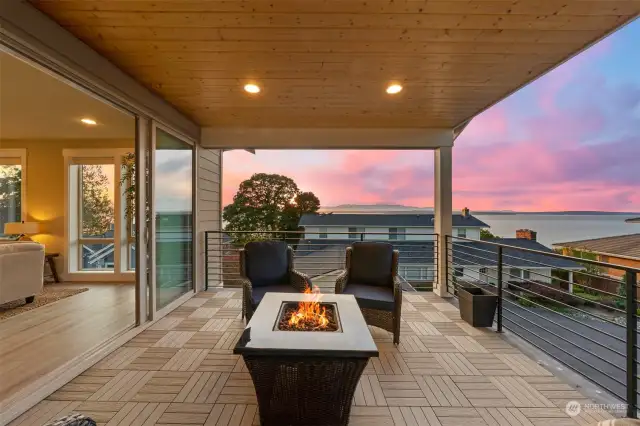 Covered deck with expansive views of Puget Sound