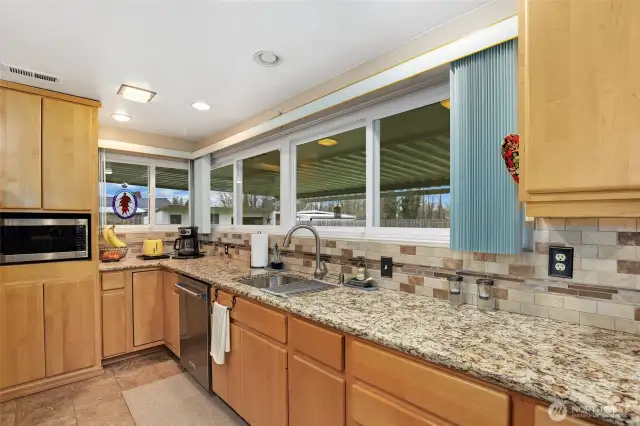 Kitchen with Granite counter tops.