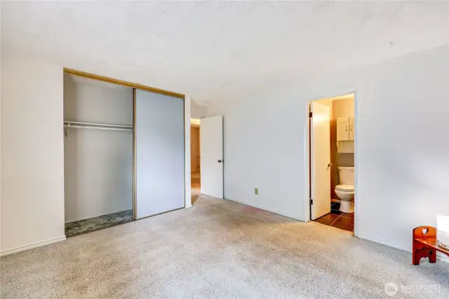 Another view of the spacious primary bedroom with it own 3/4 bath.