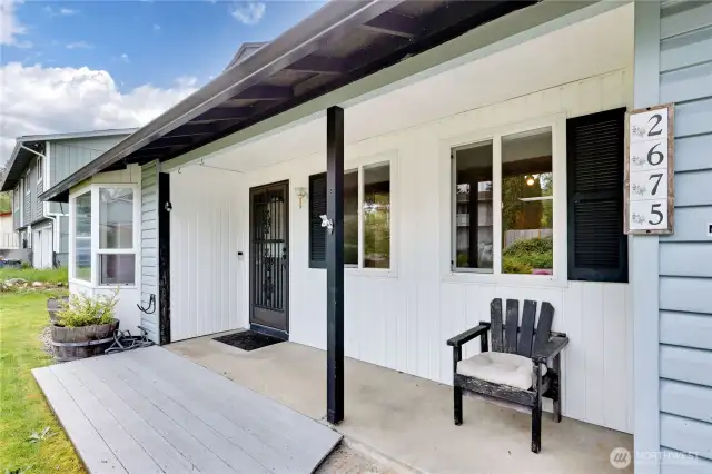 Easy access to the front door and wide overhang to sit outside.