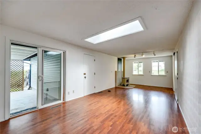 Another view of the living room with a slider onto the patio.