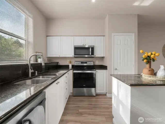Large kitchen island and updated counters and appliances