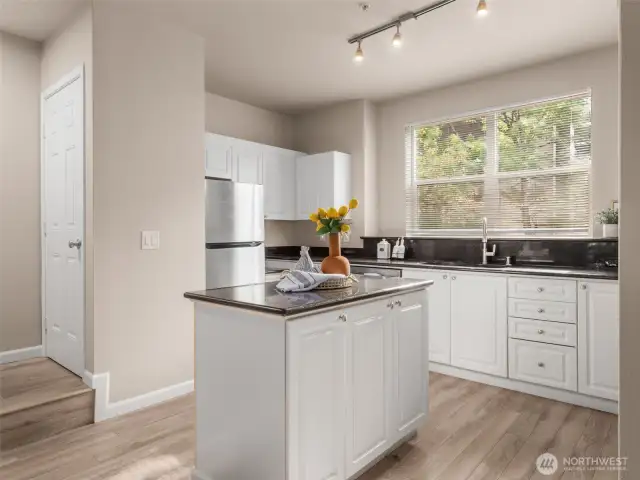 Large kitchen island and updated counters and appliances