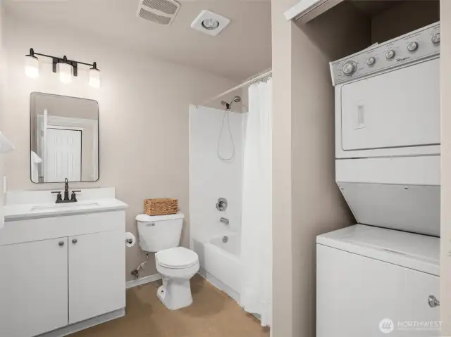 Primary bath with stackable washer and dryer