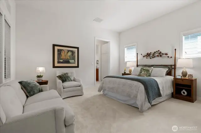 Secondary en-suite provides space for a queen or king-sized bed plus sitting area, and offers a full bath