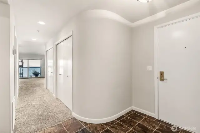 Just inside the front door you'll find lots of  storage on your way to the main living areas  with incredible views of the waterfront.