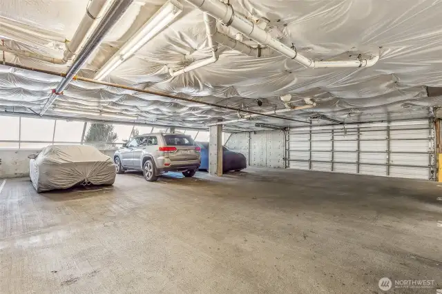 Covered/garage parking- 2 spots. 8A is  located on the main level and second is  located in basement.