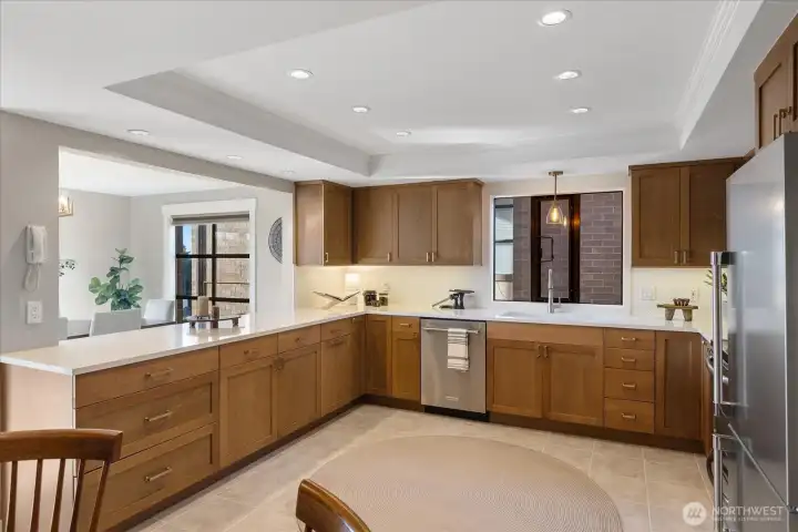 Amazing kitchen, newer cabinetry, newer appliances, quartz counters, tile flooring. . .