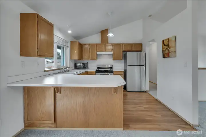 Well laid out kitchen with eating bar.