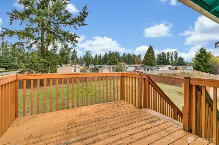 Sun deck with direct access to the huge backyard.