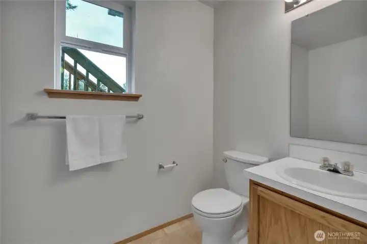 Convenient half bath on lower level.