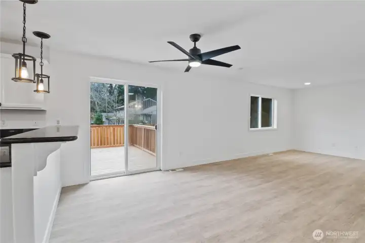 High Bar Countertop in Kitchen, Slider door leading out to brand new cedar deck