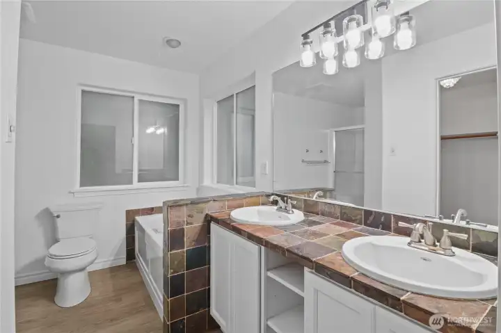 Primary Bedroom Bathroom with double sink & Jetted Tub