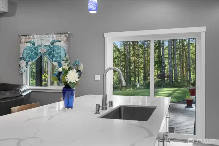 Back sliding door goes to the fully fenced backyard.