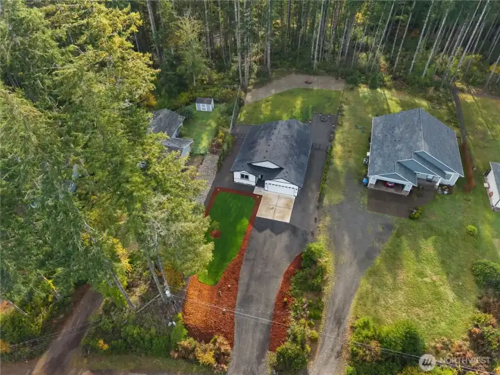 Aerial view of the property and area.