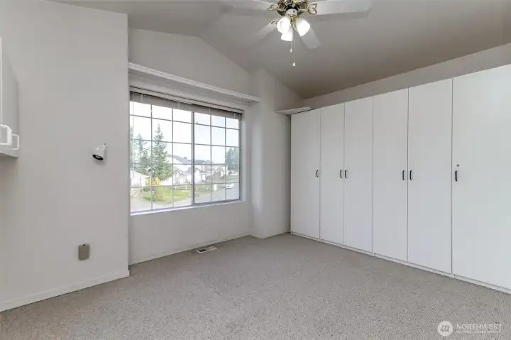 Bonus room with built in storage cabinets