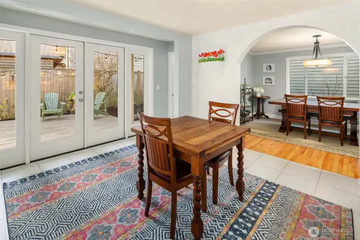 Kitchen seating flows seamlessly into the outdoor space
