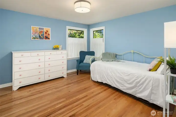 Main floor bedroom overlooking side yard