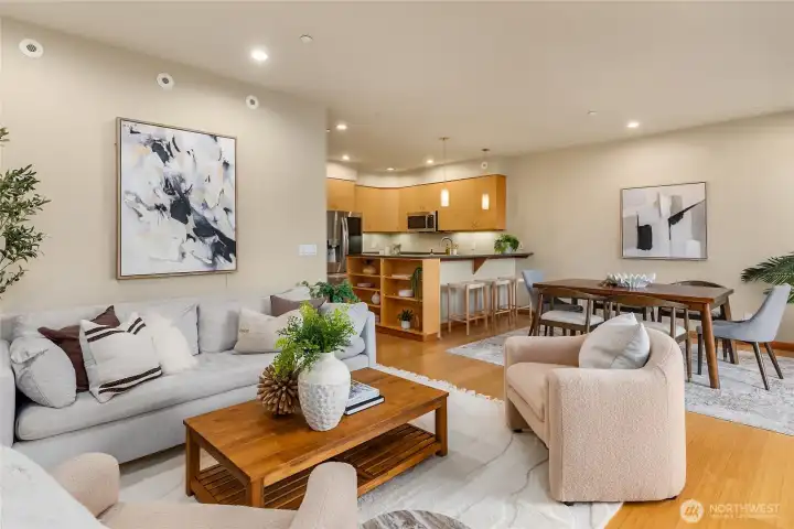 A look from the living room to the open dining area, with great south facing light.