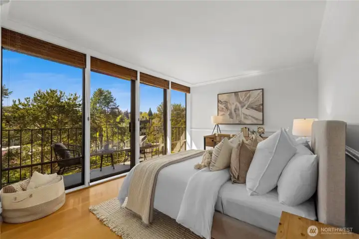 Guest bedroom with a spacious deck.